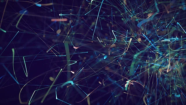 Teal and violet light particles flying through darkness