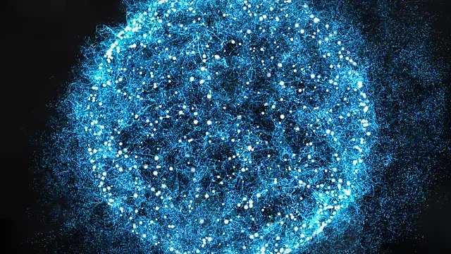 Glowing sphere of teal light particles