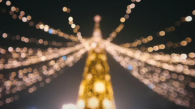 Warm bokeh lights glowing in darkness