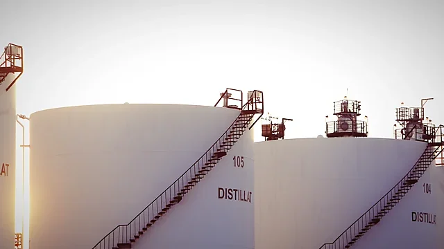 Industrial tanks and metal stairs in a plant