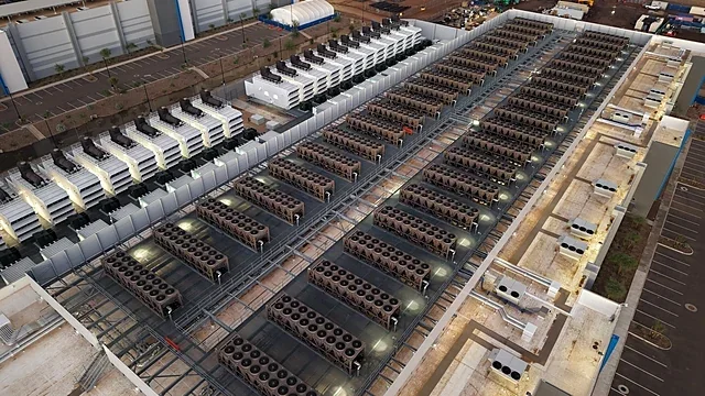 Data centre roof with rows of cooling towers