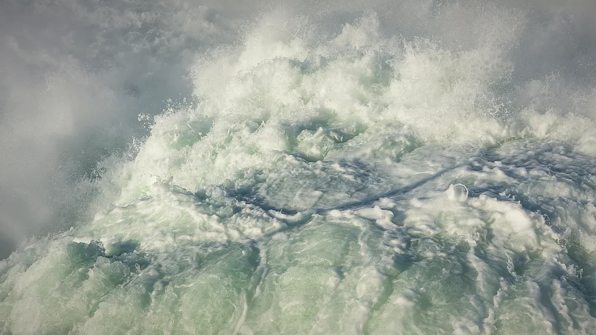 White water rushing and splashing over a waterfall