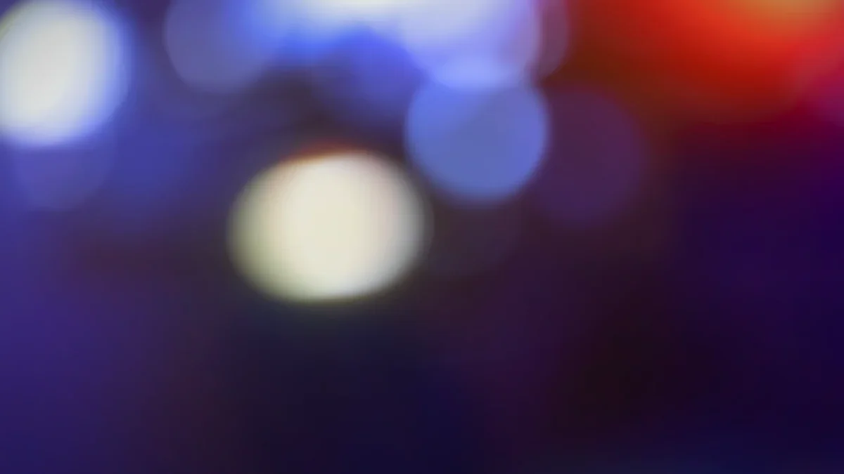 Cool blue bokeh lights glowing on a dark background