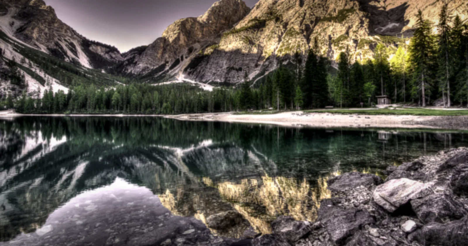 Mountains mirrored in a still alpine lake