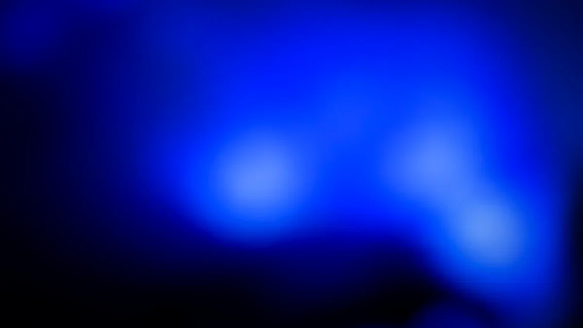 Soft blue bokeh lights glowing in the dark