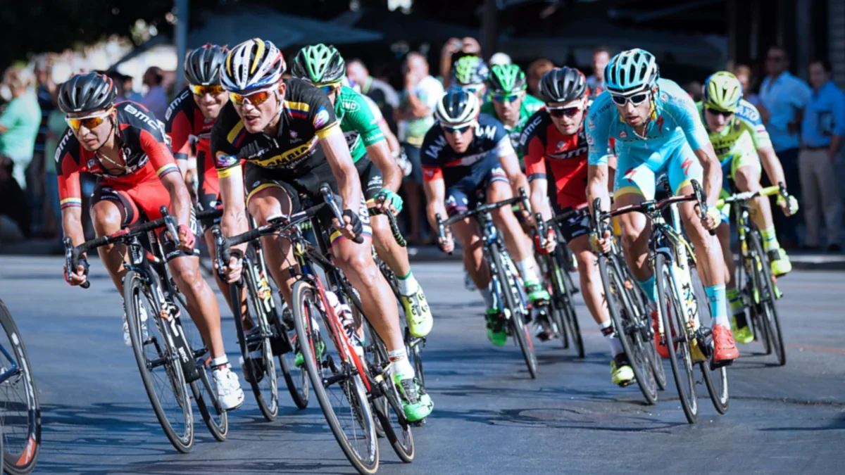 Cyclists racing along an open road