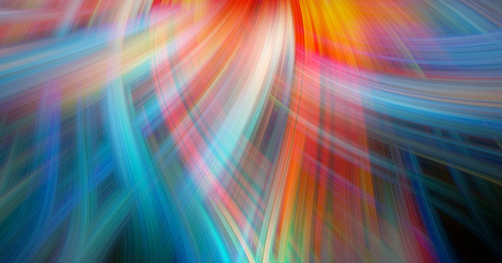 Vivid multicolored abstract light swirls on a dark field