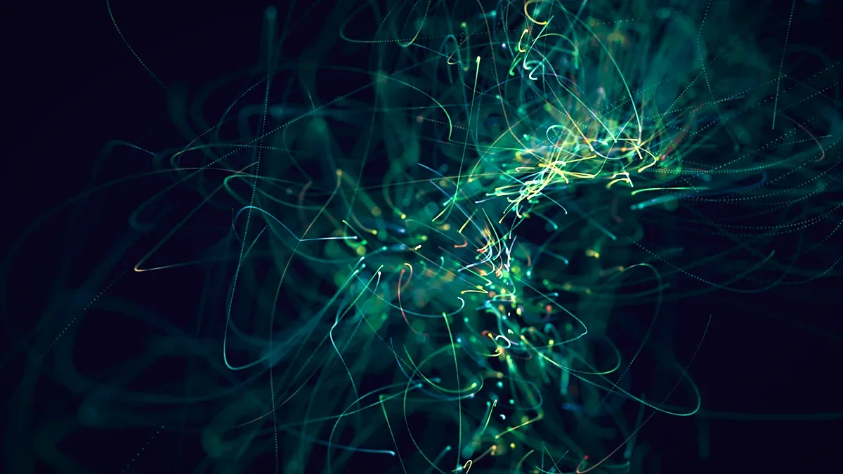 Dense teal network of fine light filaments on a dark background